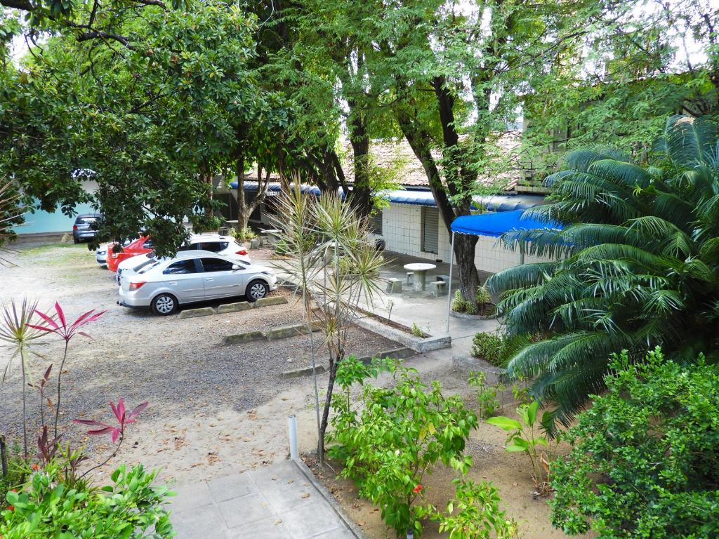 Um jardim em Pousada Cecosne
