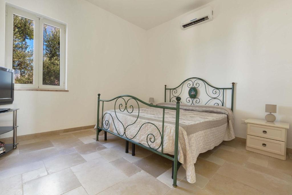 Posteľ alebo postele v izbe v ubytovaní Villa Sorrentino by Perle di Puglia