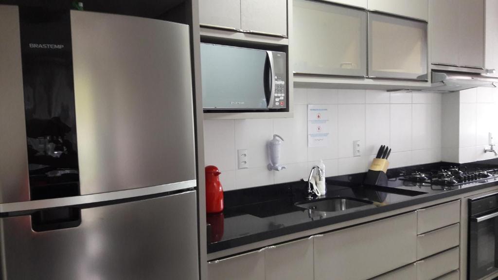  Florianópolis Canasvieiras Apartamento inteiro 3 quartos com ar piscina playground 2 garagens