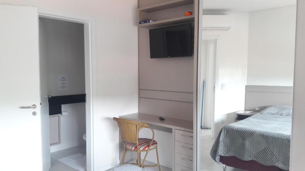 Florianópolis Canasvieiras Apartamento inteiro 3 quartos com ar piscina playground 2 garagens
