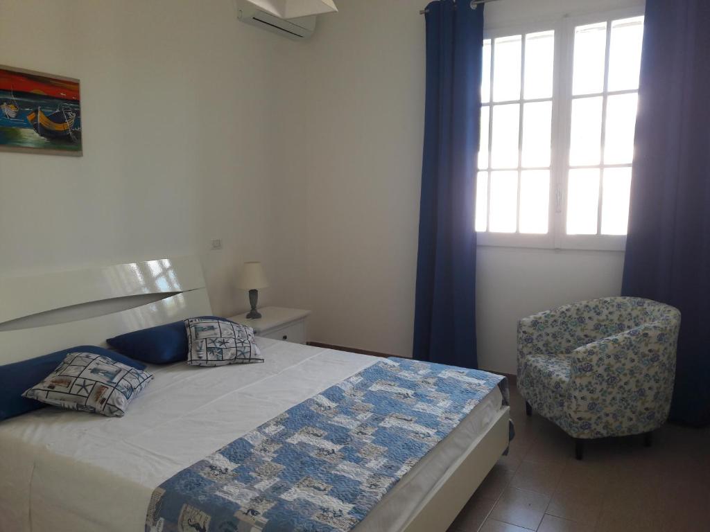 A bed or beds in a room at La casa dei venti