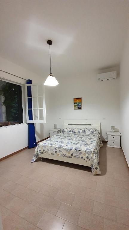 A bed or beds in a room at La casa dei venti