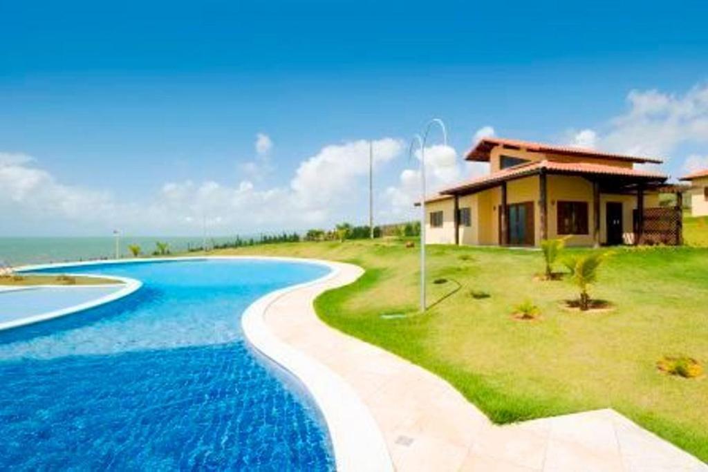  Chalé condomínio beira mar em Zumbi Beach Resort