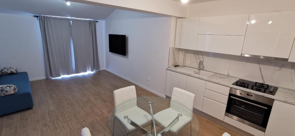 Kuchyň nebo kuchyňský kout v ubytování Apartmani Jolanda
