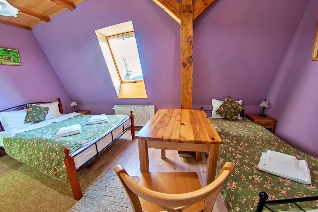 Postel nebo postele na pokoji v ubytování Młyn Wielisław Agroturystyka i Restauracja