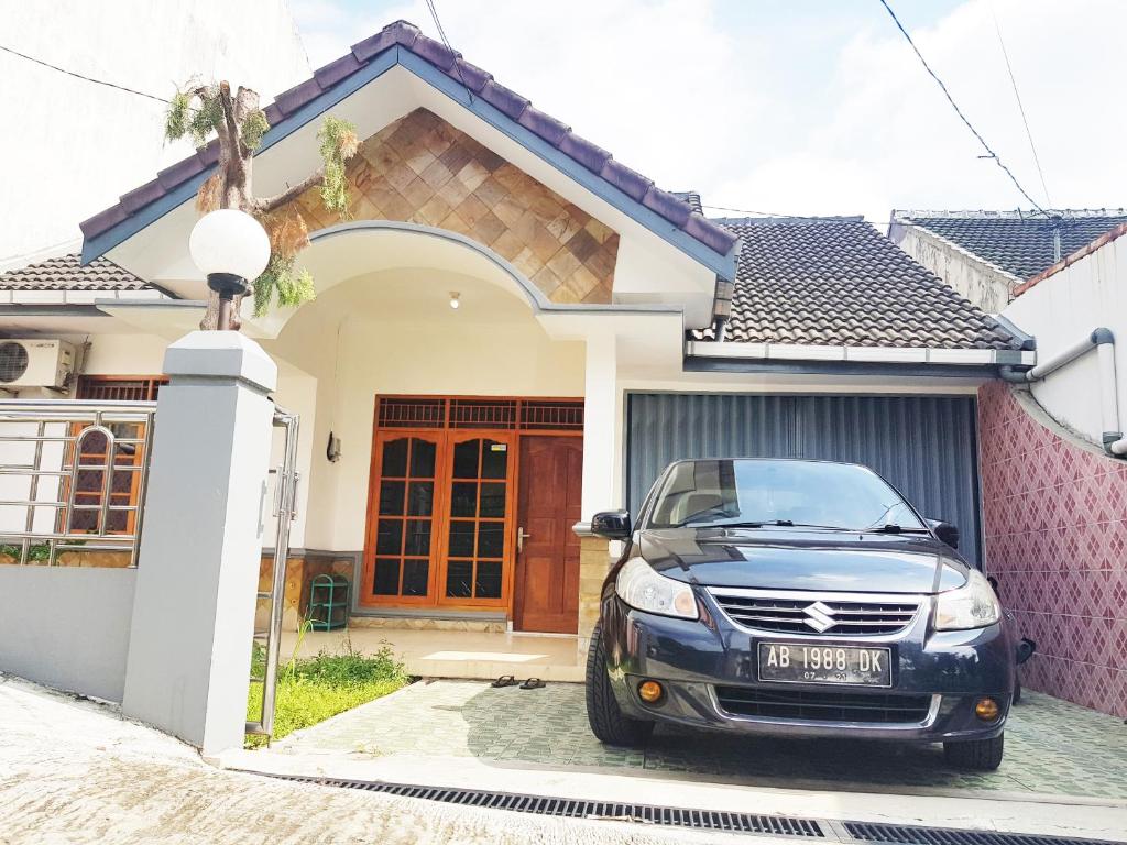 Jogja homestay interior with local decor and comfortable bedding