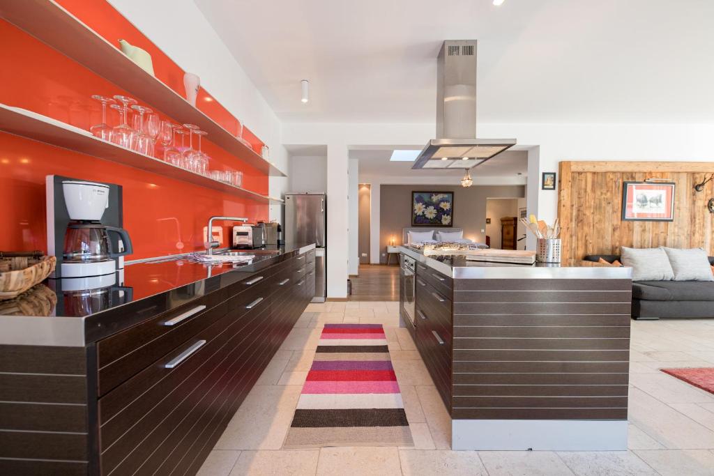 Kuchyň nebo kuchyňský kout v ubytování Alpen Loft