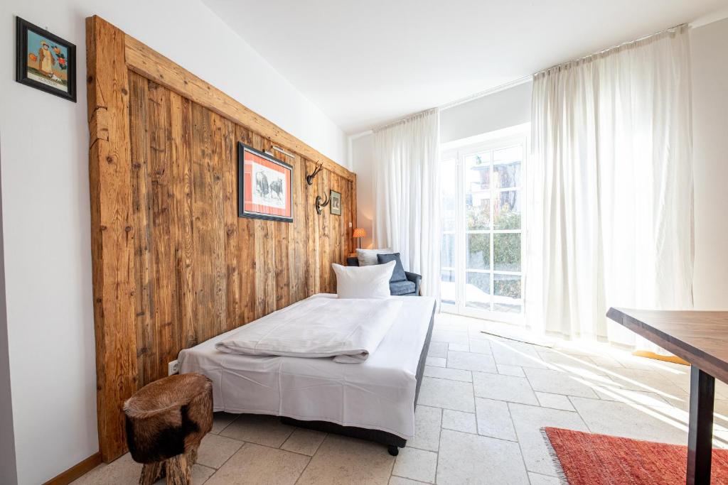 Postel nebo postele na pokoji v ubytování Alpen Loft