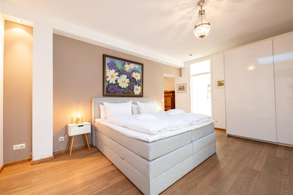 Postel nebo postele na pokoji v ubytování Alpen Loft