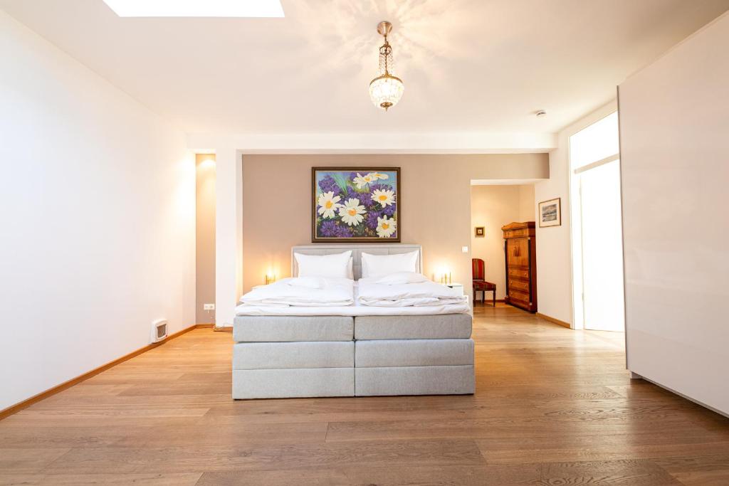 Postel nebo postele na pokoji v ubytování Alpen Loft