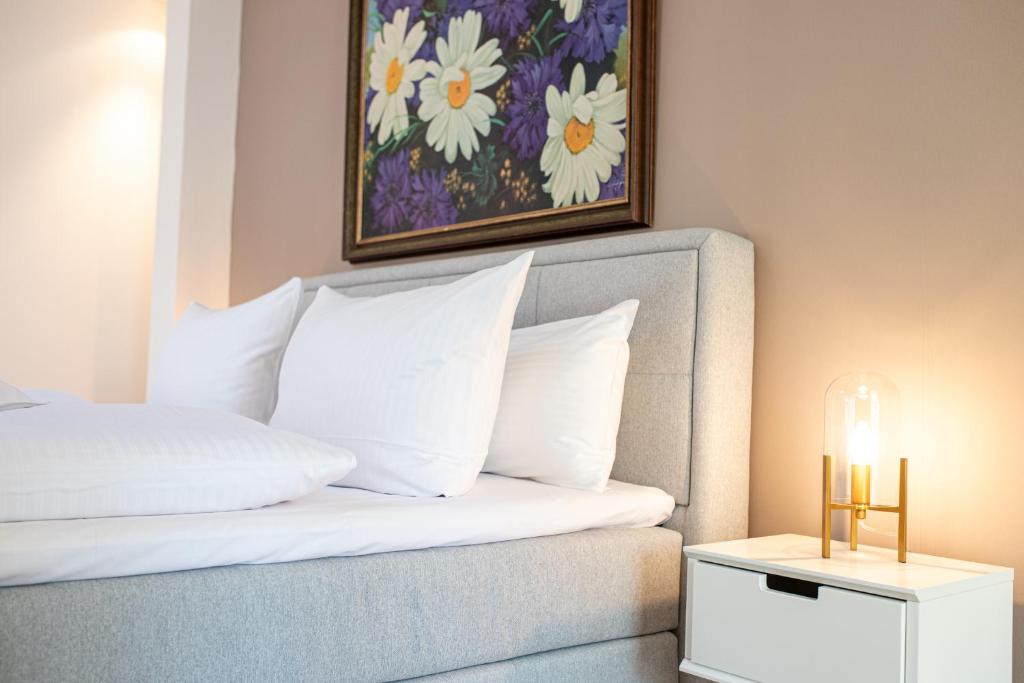 Postel nebo postele na pokoji v ubytování Alpen Loft