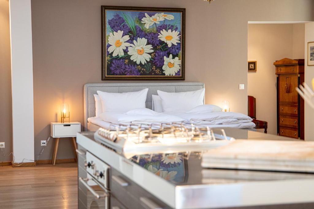 Postel nebo postele na pokoji v ubytování Alpen Loft
