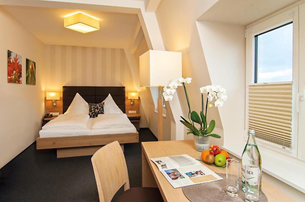 Postel nebo postele na pokoji v ubytování Hotel Der Löwen
