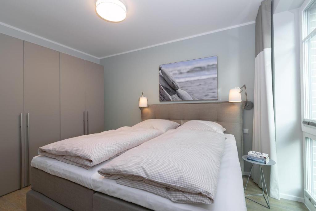 Postel nebo postele na pokoji v ubytování Haffkamp 23 Wohnung 4