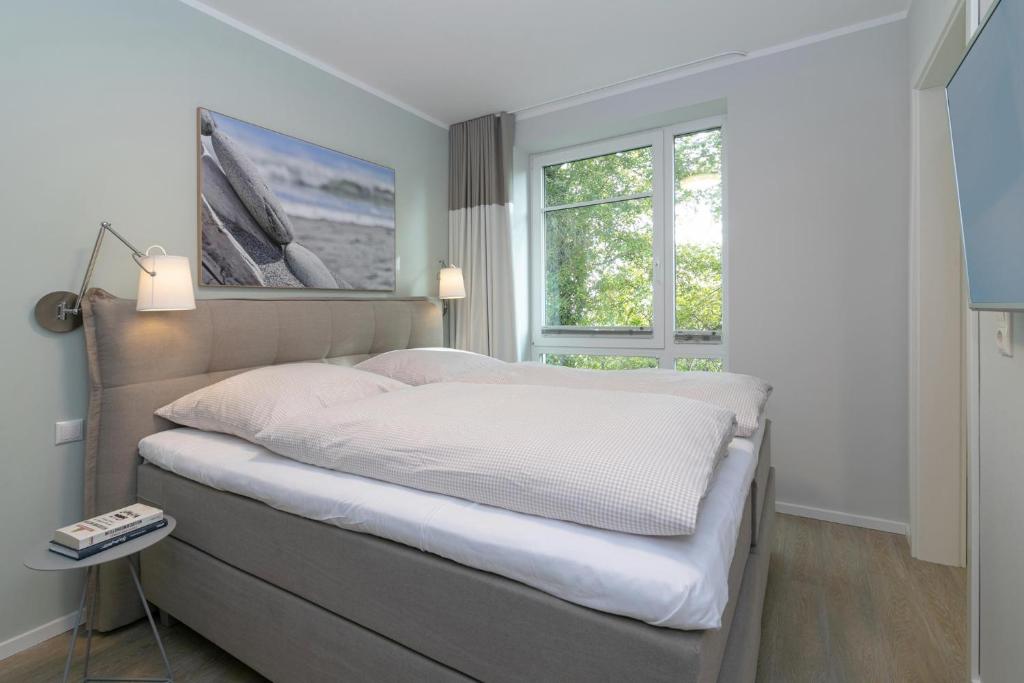 Postel nebo postele na pokoji v ubytování Haffkamp 23 Wohnung 4