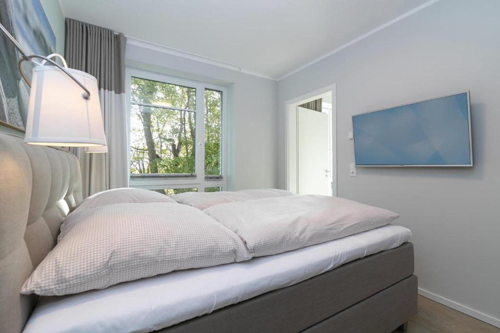 Postel nebo postele na pokoji v ubytování Haffkamp 23 Wohnung 4