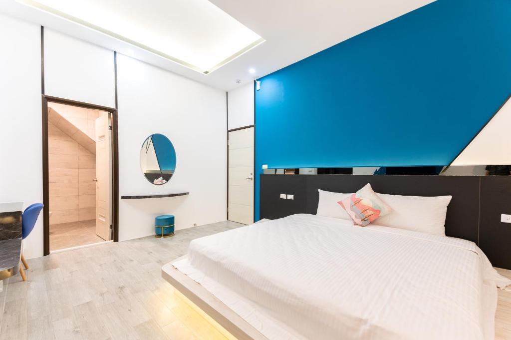 Postel nebo postele na pokoji v ubytování Haipai Sweetheart Homestay
