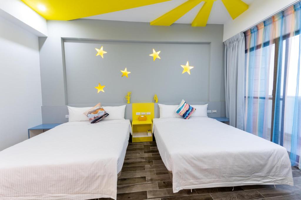 Postel nebo postele na pokoji v ubytování Haipai Sweetheart Homestay