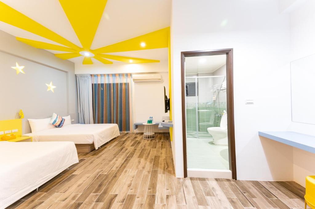 Postel nebo postele na pokoji v ubytování Haipai Sweetheart Homestay