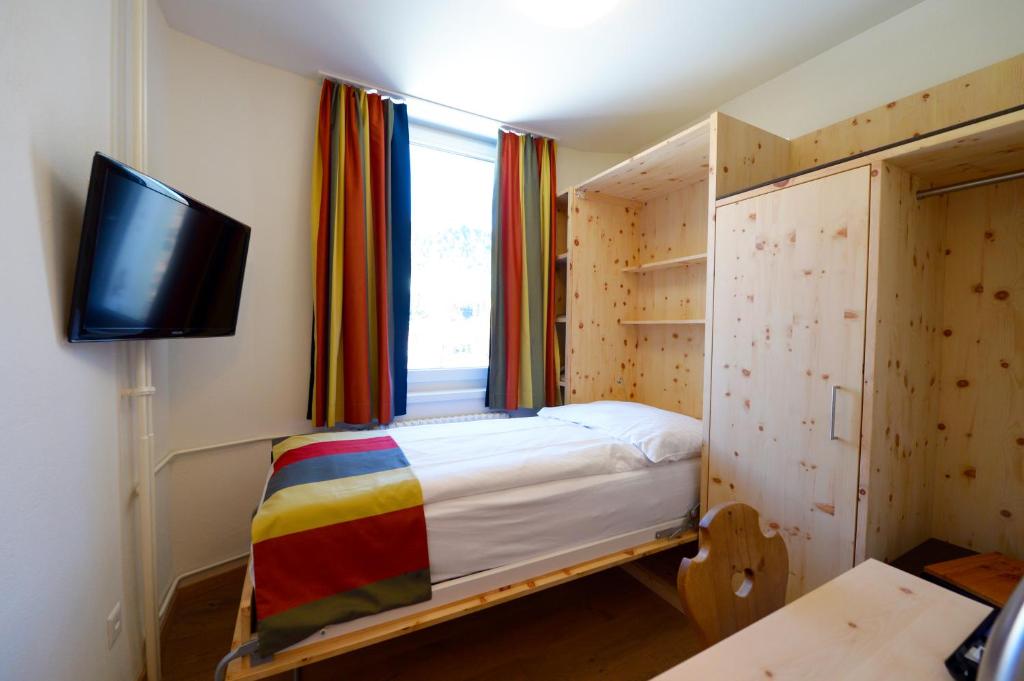 TV a/nebo společenská místnost v ubytování Hotel Waldhaus am See