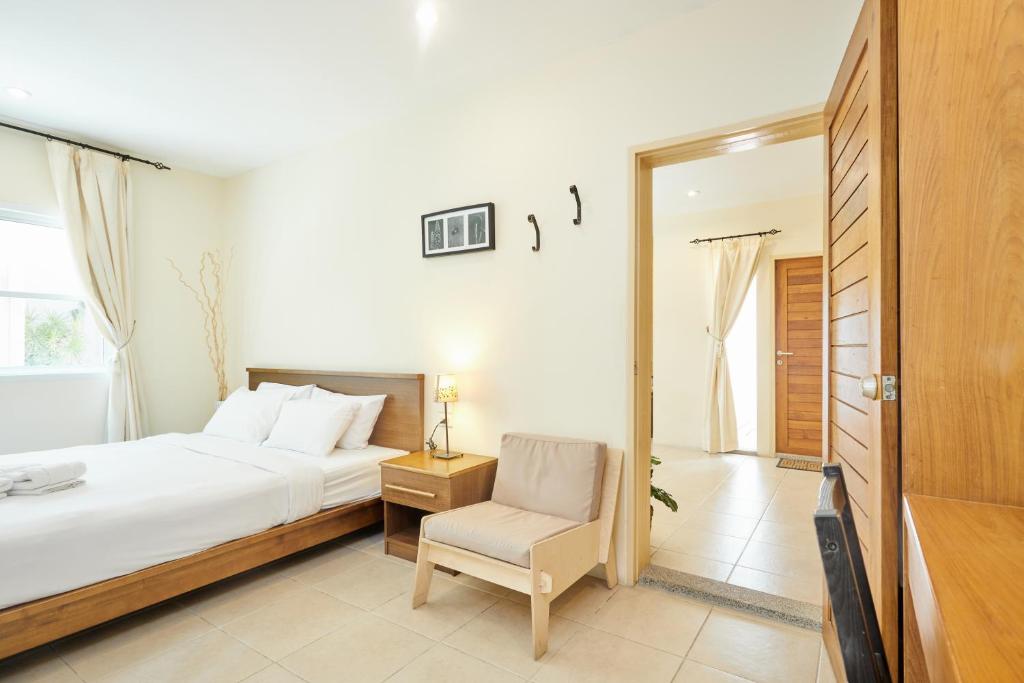 Postel nebo postele na pokoji v ubytování Talay Hotel and Villa Cha-am