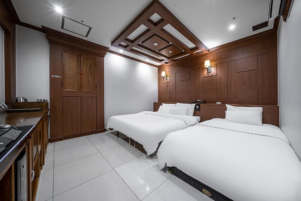 Postel nebo postele na pokoji v ubytování Hotel Cullinan Yongin