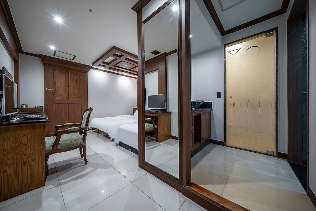 Postel nebo postele na pokoji v ubytování Hotel Cullinan Yongin