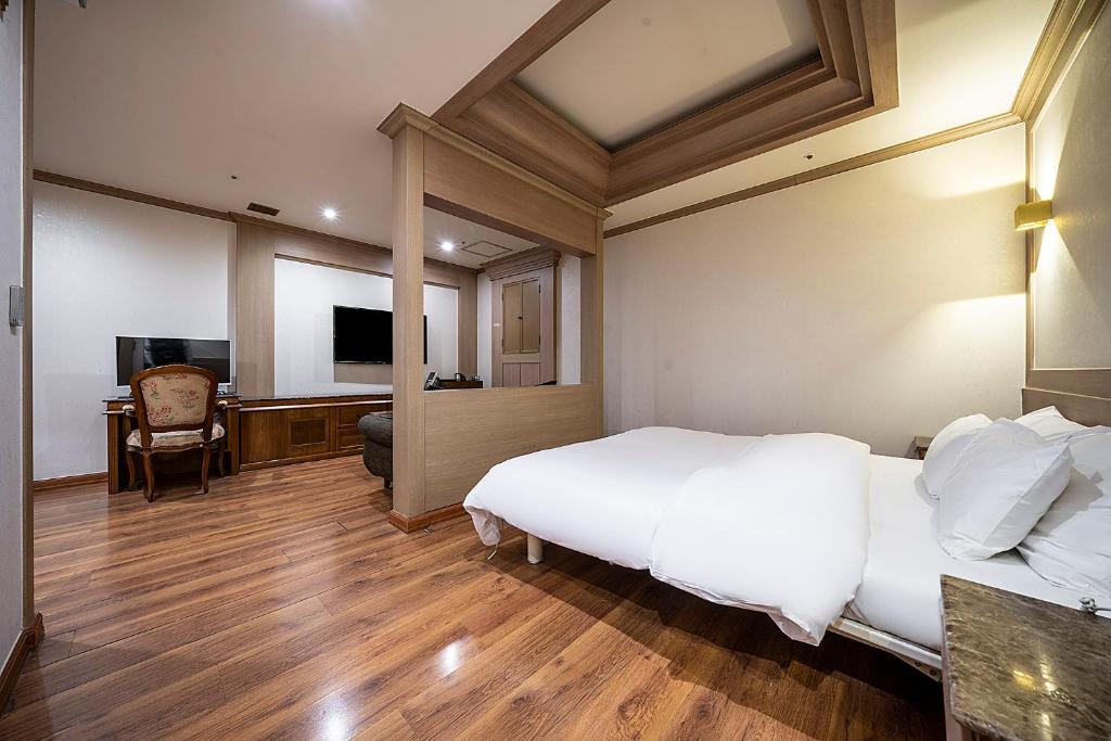Postel nebo postele na pokoji v ubytování Hotel Cullinan Yongin