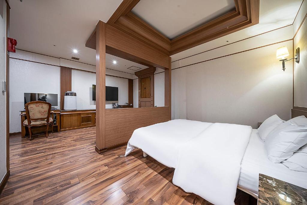 Postel nebo postele na pokoji v ubytování Hotel Cullinan Yongin