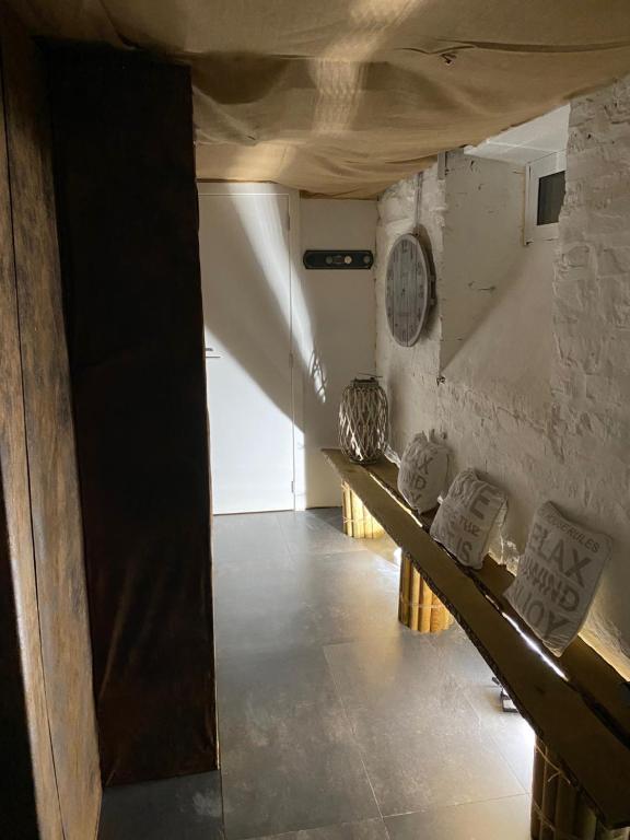 Posezení v ubytování Le Retour aux Sources - Chambre d'Hôte chaleureuse et conviviale