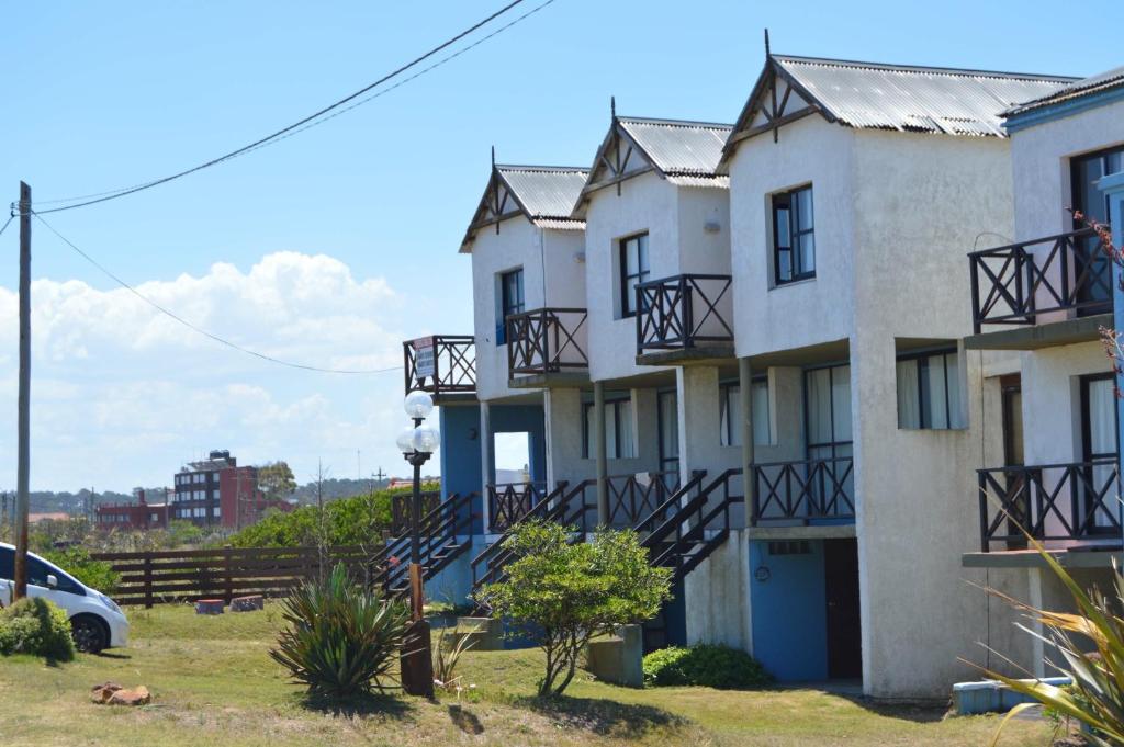 a row of houses with balconies on them at Balcones del Cabito in La Paloma