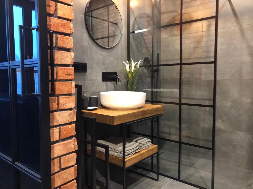 Kúpeľňa v ubytovaní Loft Apartment Browary Warszawskie