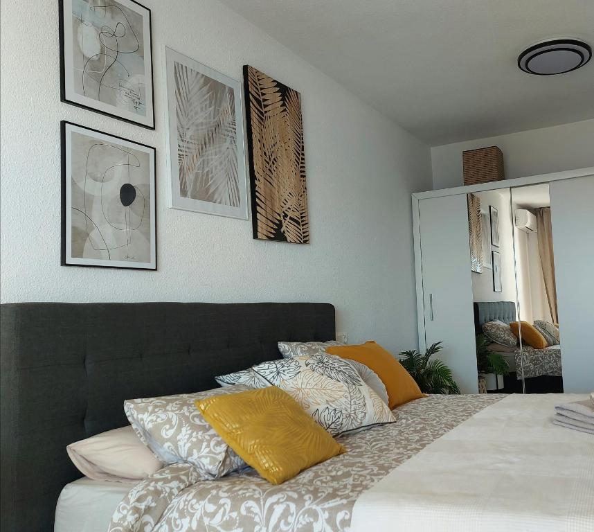 Posteľ alebo postele v izbe v ubytovaní Sunset Beach