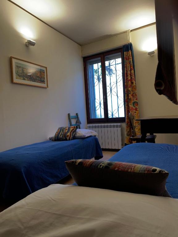 A bed or beds in a room at ARTISTICO - Artistic flat in front of GUGGENHEIM COLLECTION