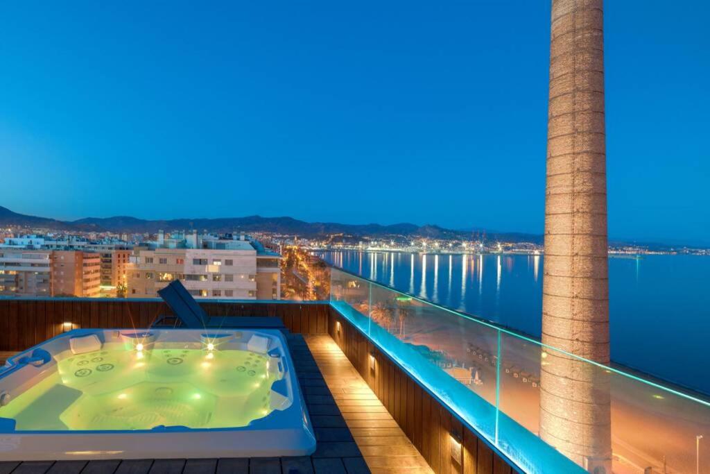 a hot tub on the balcony of a cruise ship at D&R penthouse on the beach in Málaga