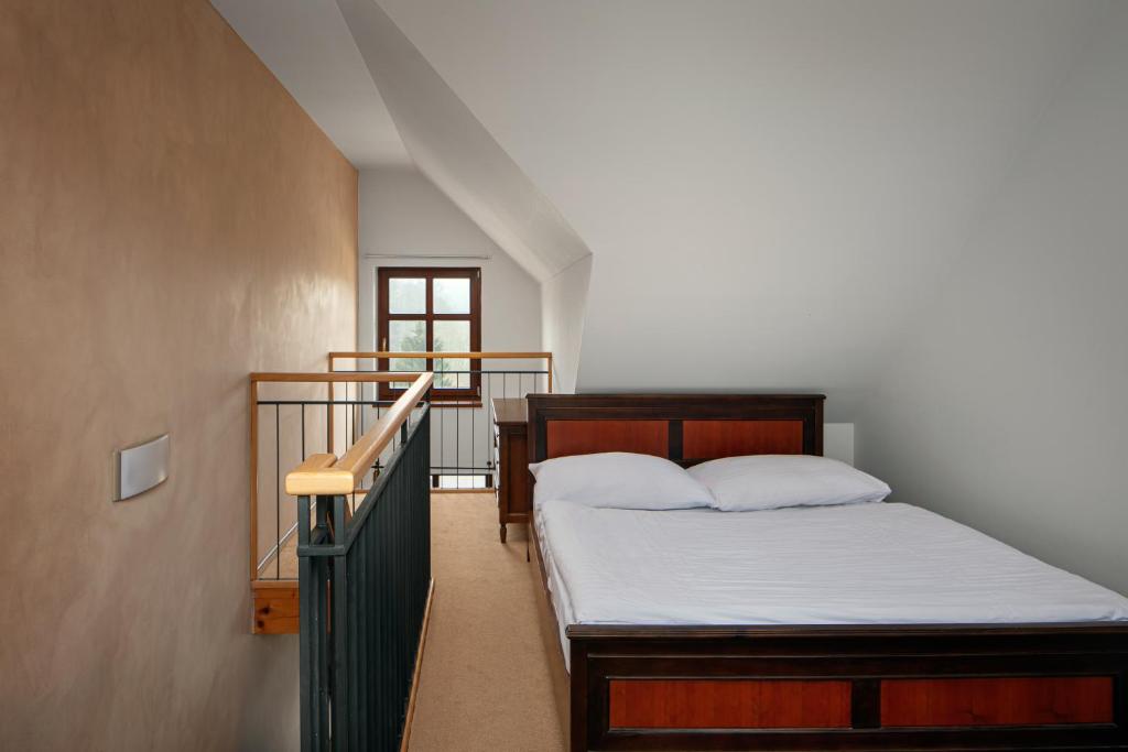 Postel nebo postele na pokoji v ubytování Hotel Javor