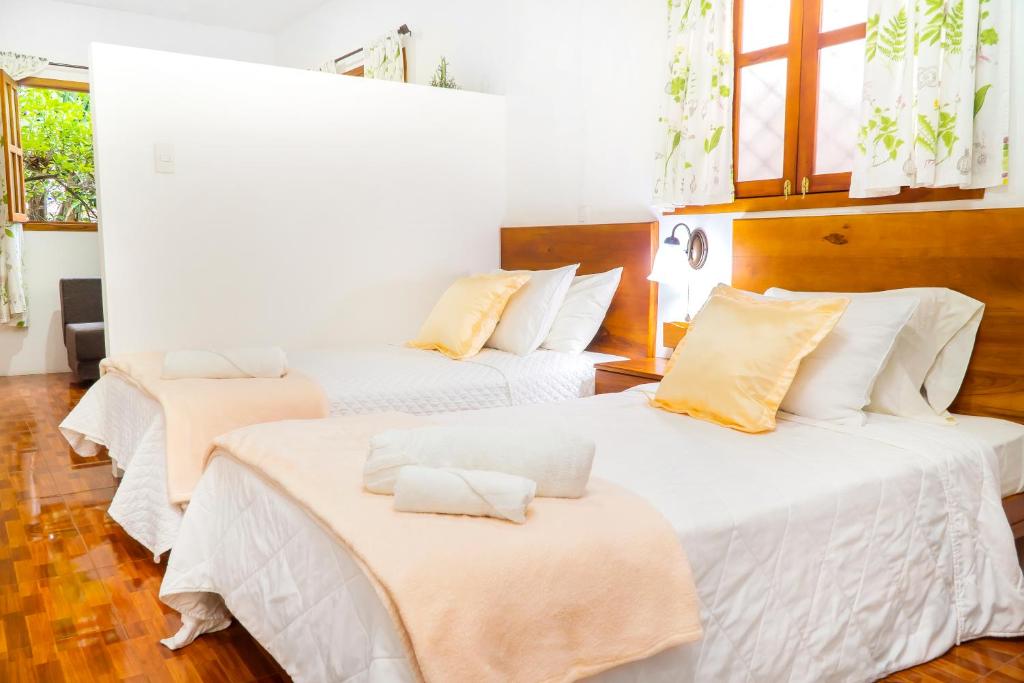 Postel nebo postele na pokoji v ubytování Hotel Boutique Platanal