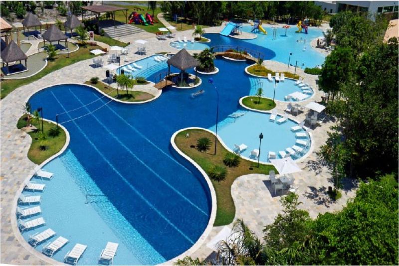 A view of the pool at Apartamento excelente e espaçoso no Iloa Residence or nearby