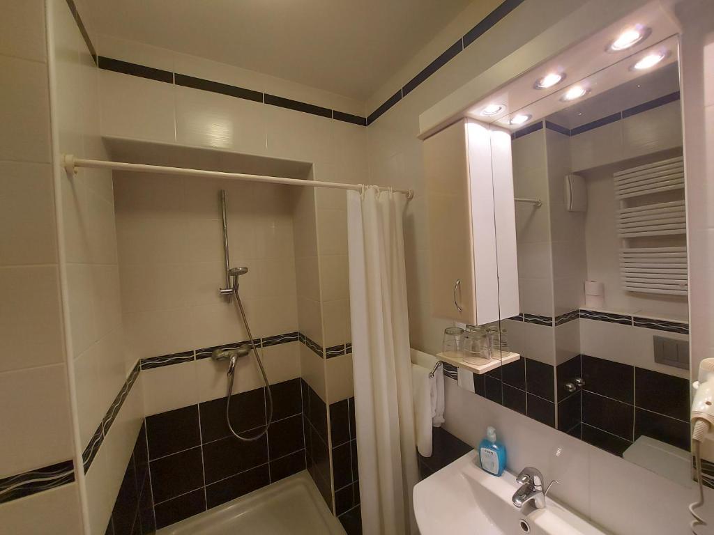 Kúpeľňa v ubytovaní Csipke Hotel