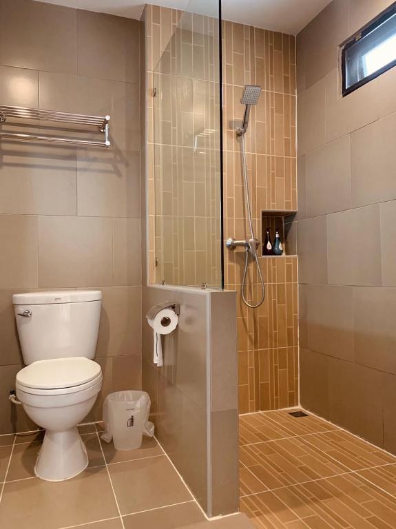Koupelna v ubytování De Hug Hotel & Residence