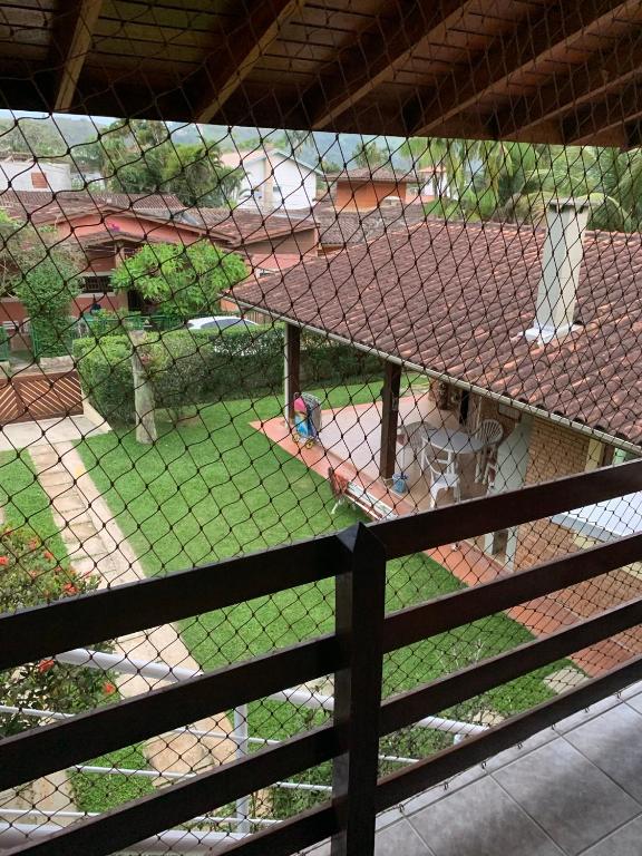  Casa praia enseada em condomínio pioneiro