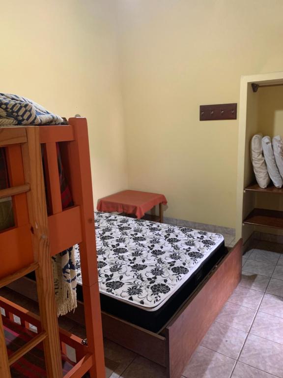  Casa praia enseada em condomínio pioneiro