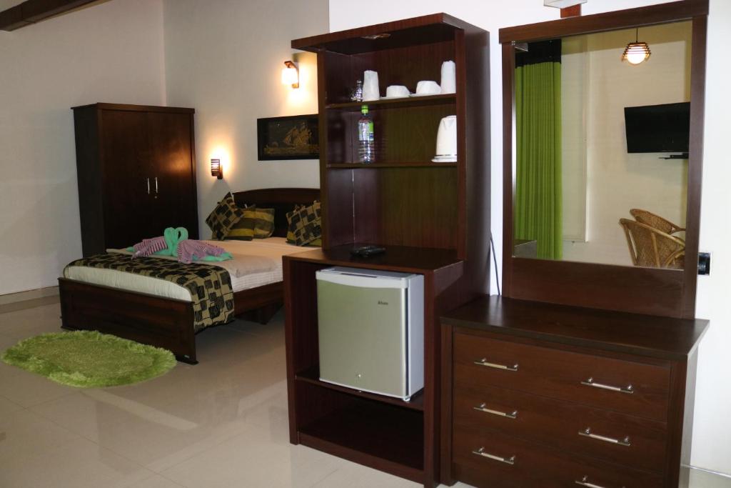 Kuchyň nebo kuchyňský kout v ubytování Hotel Ella`s Edge