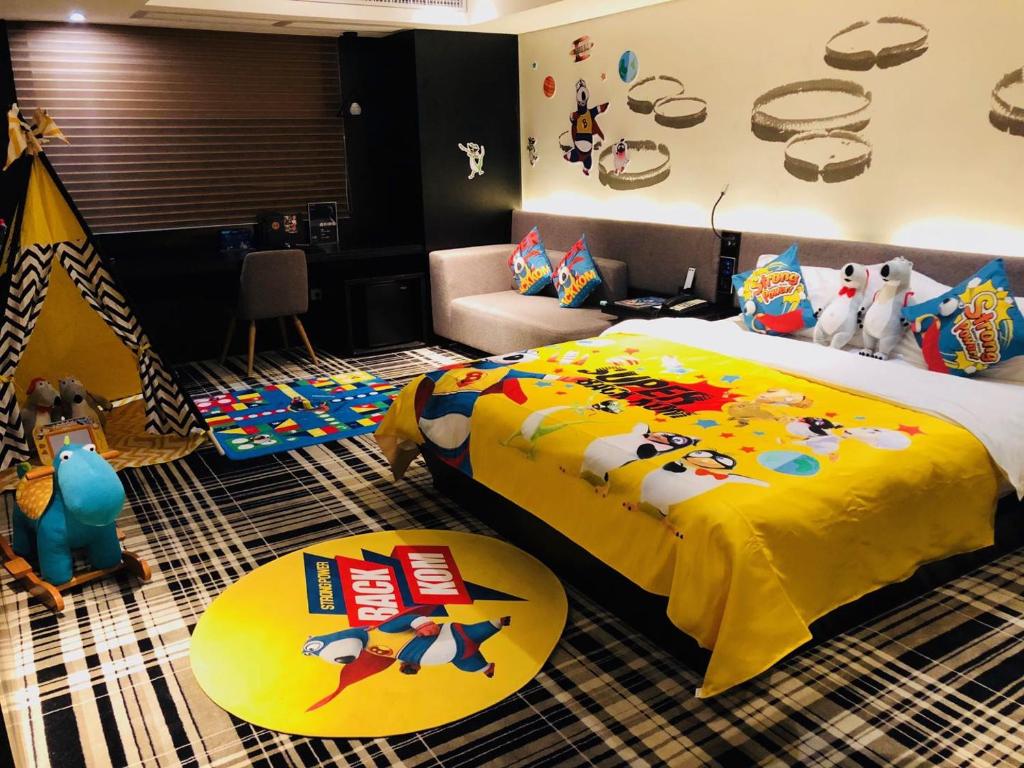 Postel nebo postele na pokoji v ubytování Likto Hotel-Free Shuttle Bus to Canton Fair