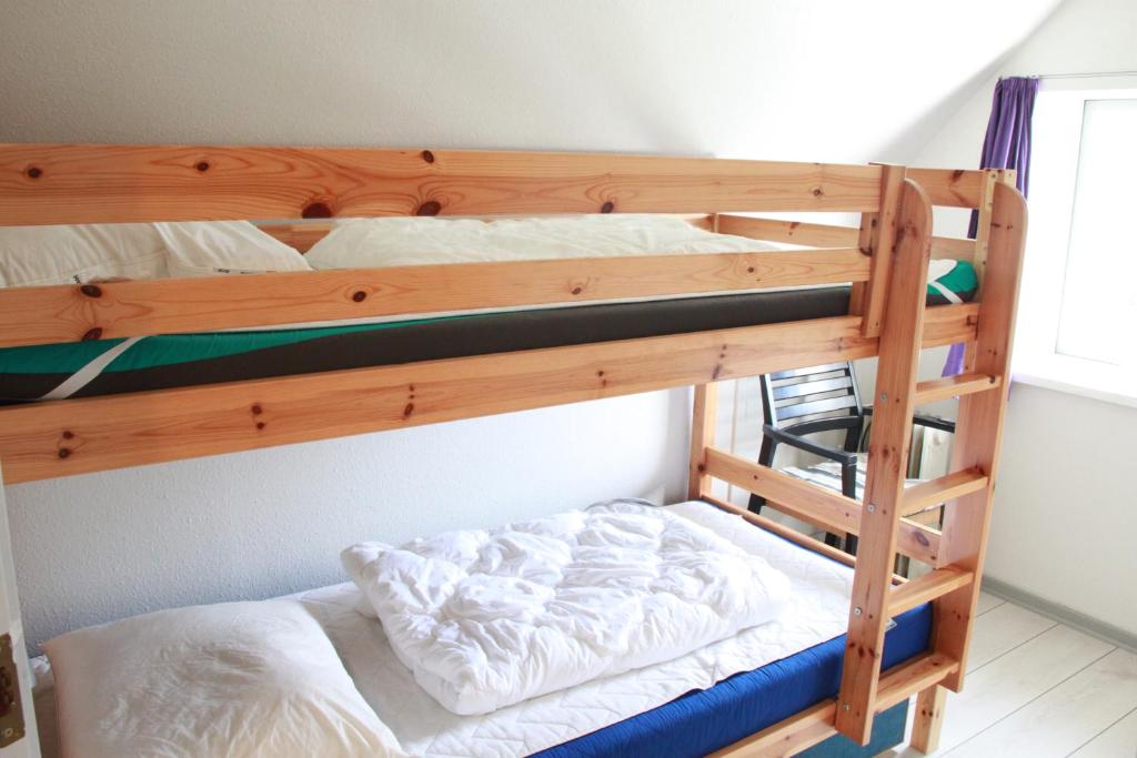 Postel nebo postele na pokoji v ubytování Rolsø Retreat