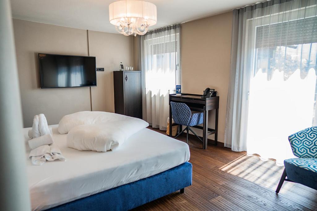 Posteľ alebo postele v izbe v ubytovaní Prunner Luxury Suites - Adults Only