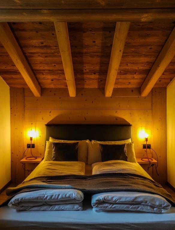 Posteľ alebo postele v izbe v ubytovaní Nix & Nivis Chalet