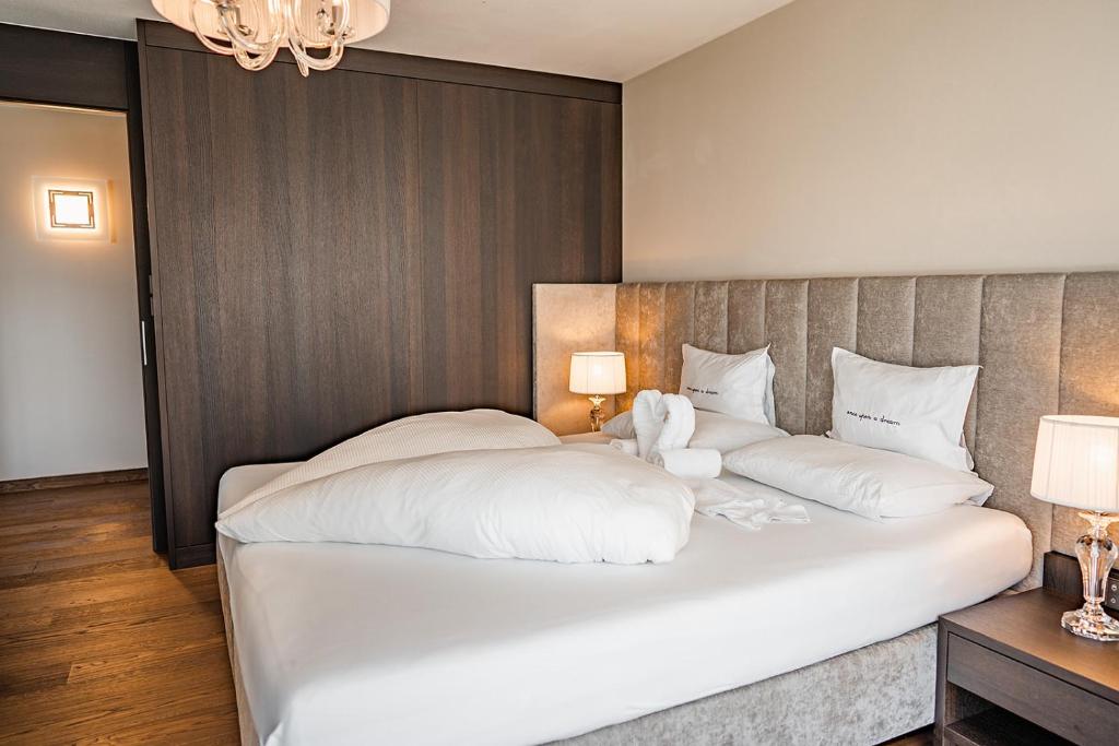 Posteľ alebo postele v izbe v ubytovaní Prunner Luxury Suites - Adults Only