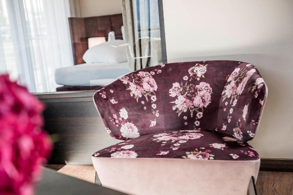 Posteľ alebo postele v izbe v ubytovaní Prunner Luxury Suites - Adults Only