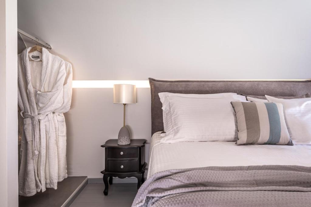 Postel nebo postele na pokoji v ubytování Santa Irina Luxury Sunny Lofts